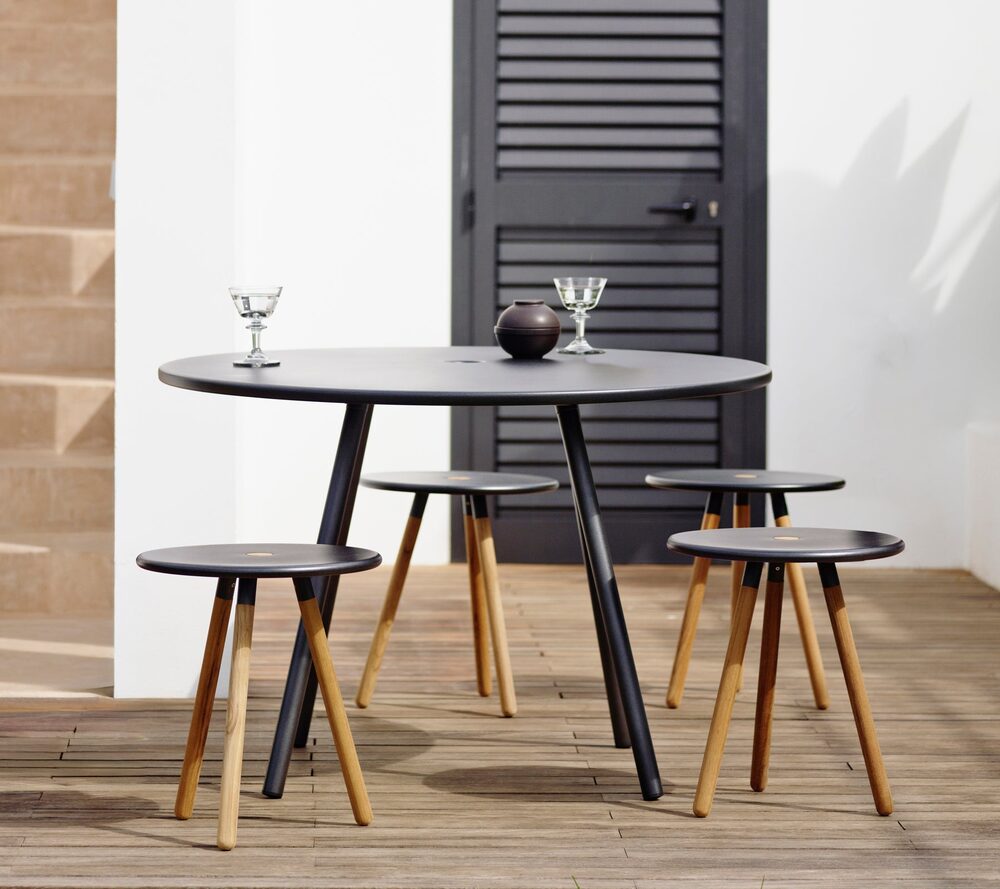 Area table styled on a garden terrace