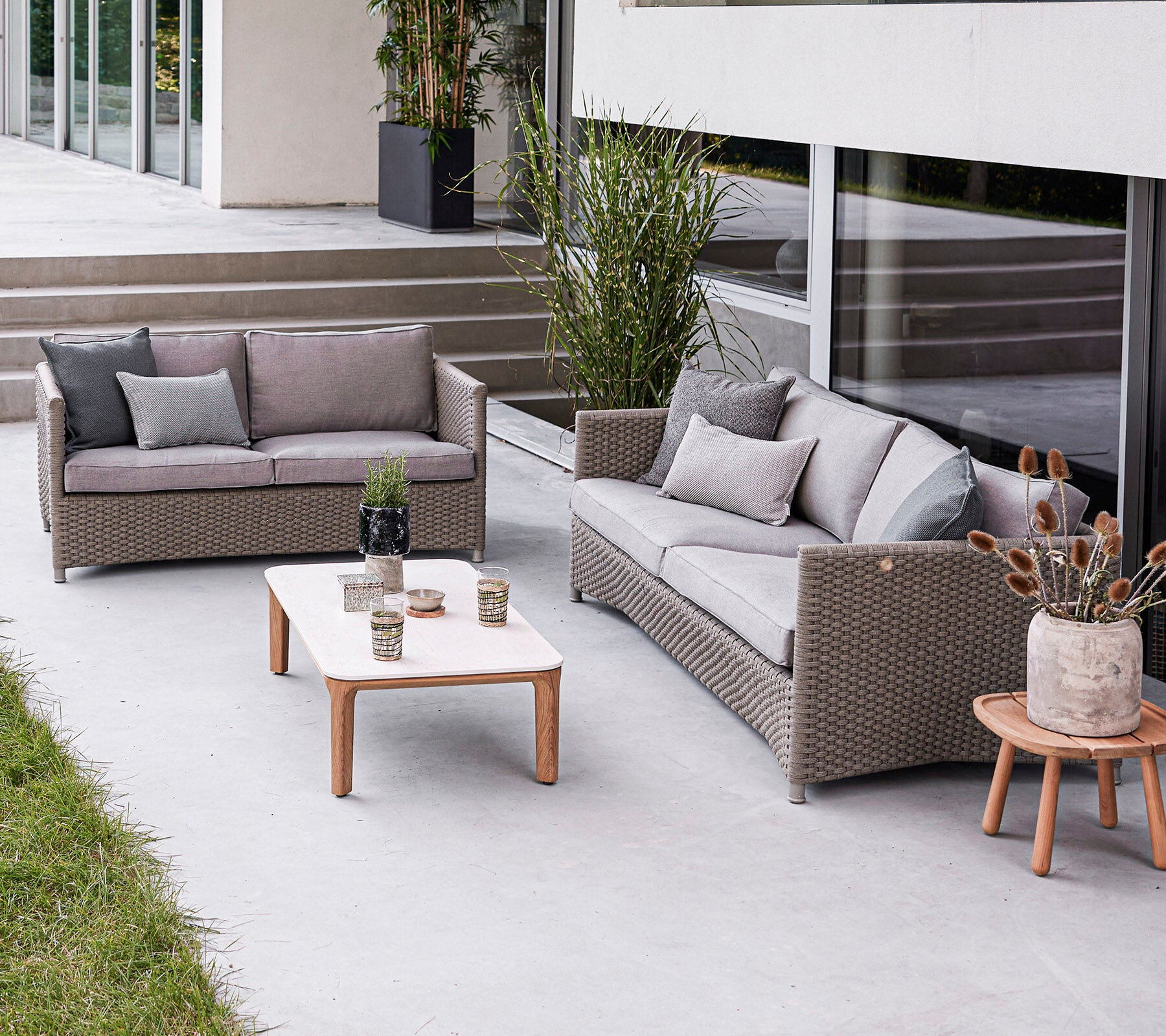 Cane-line Diamond lounge set in natural rope weave on a terrace