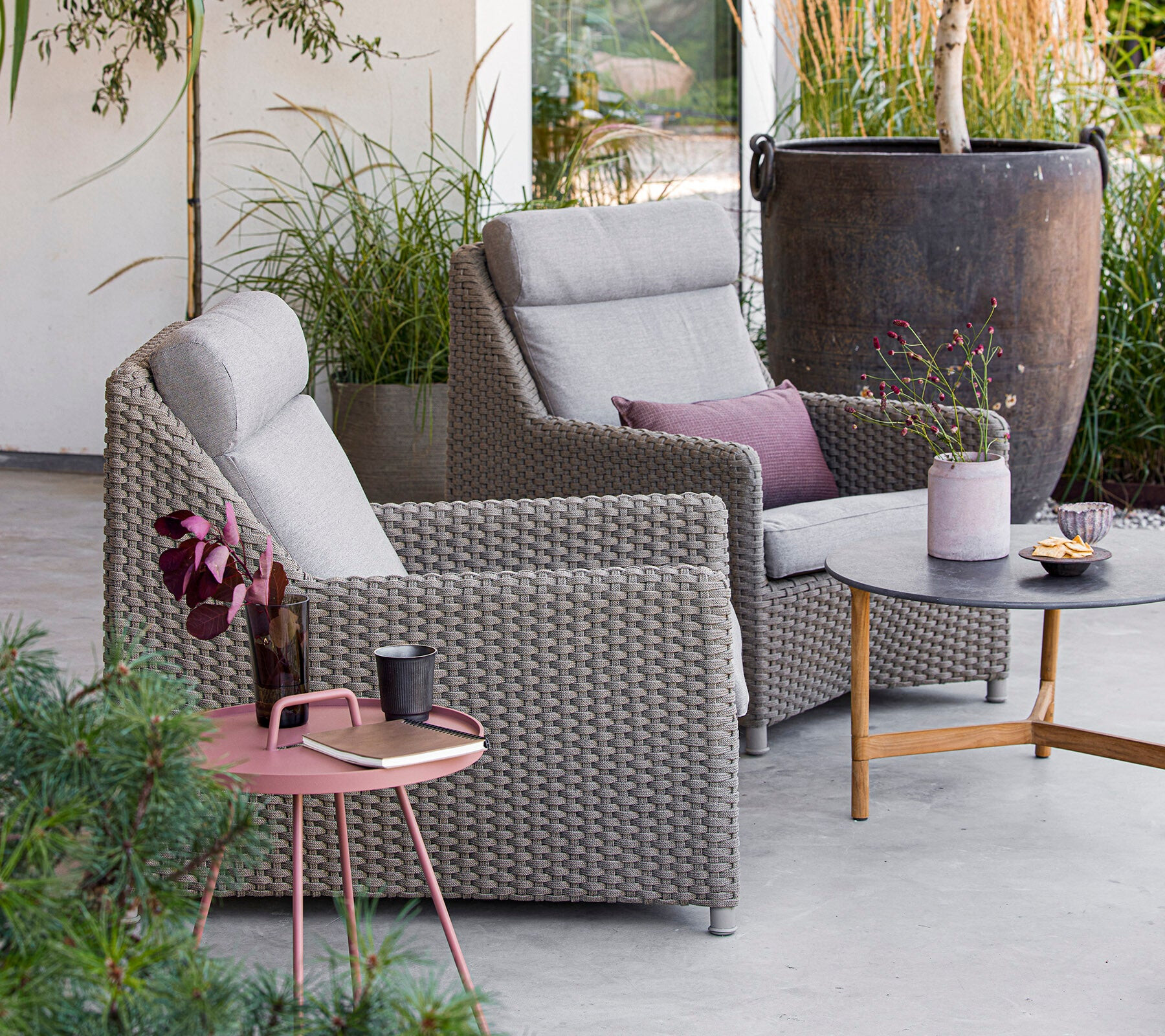 Cane-line Diamond highback lounge chair styled outdoors