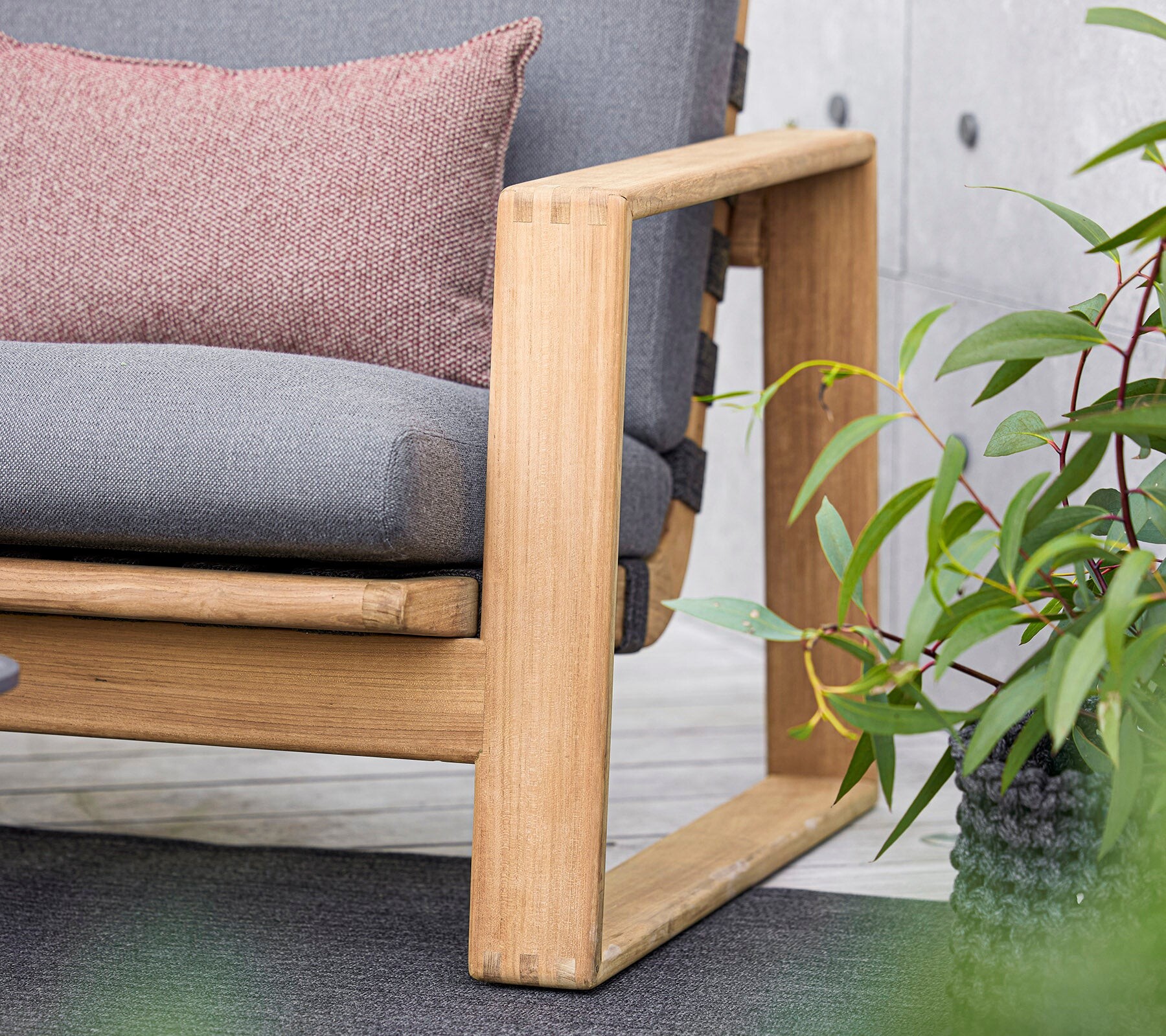 Cane-line Endless Soft highback chair styled with a cushion