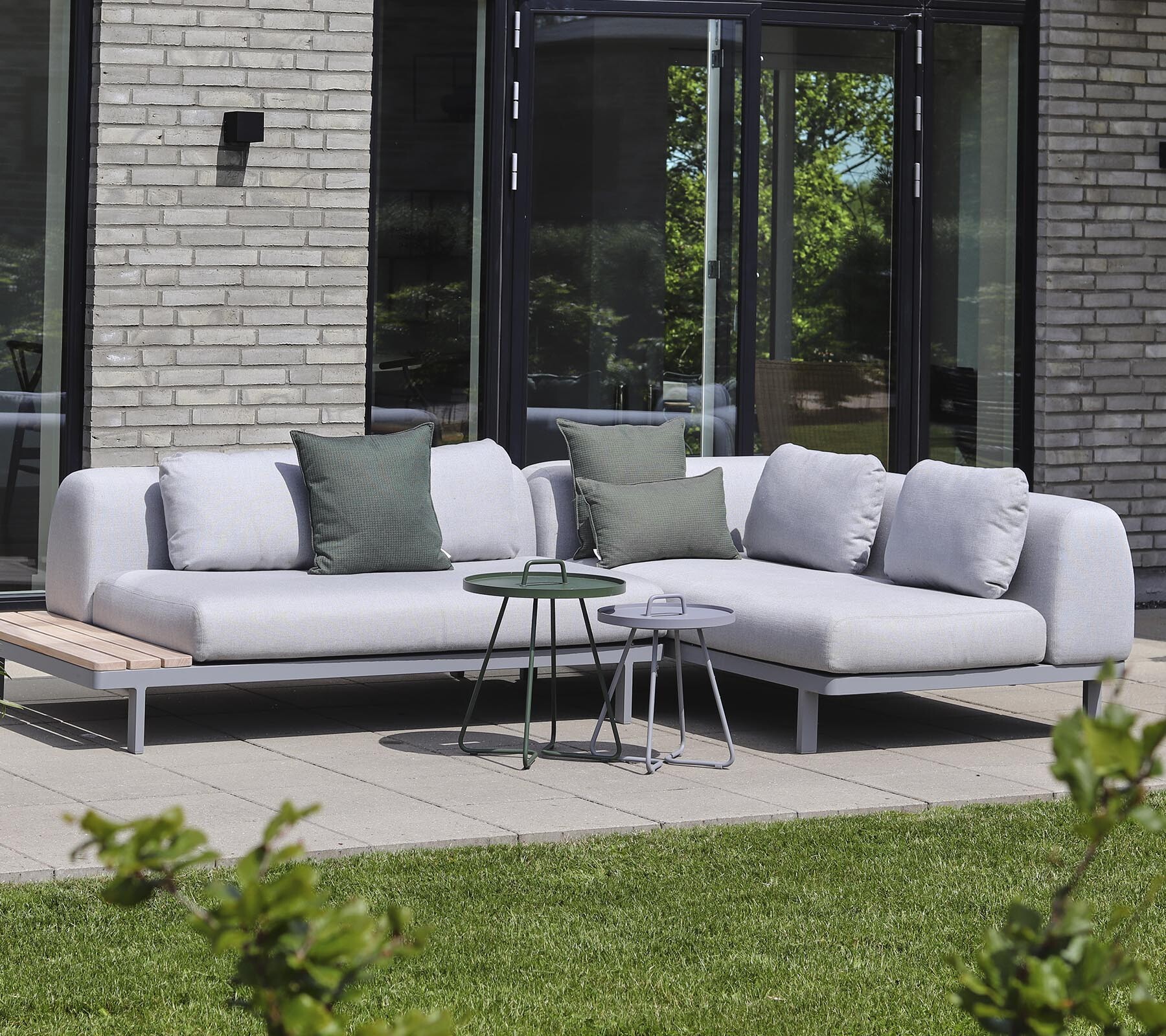 Cane-line Space modular corner sofa with cushions on a terrace