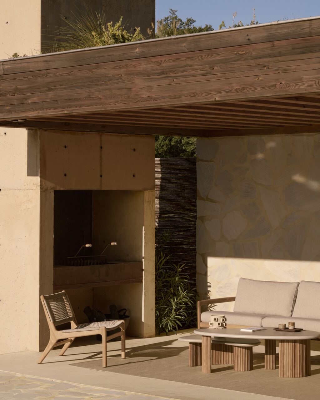 Jack Woven outdoor lounge chair with Boomerang coffee tables