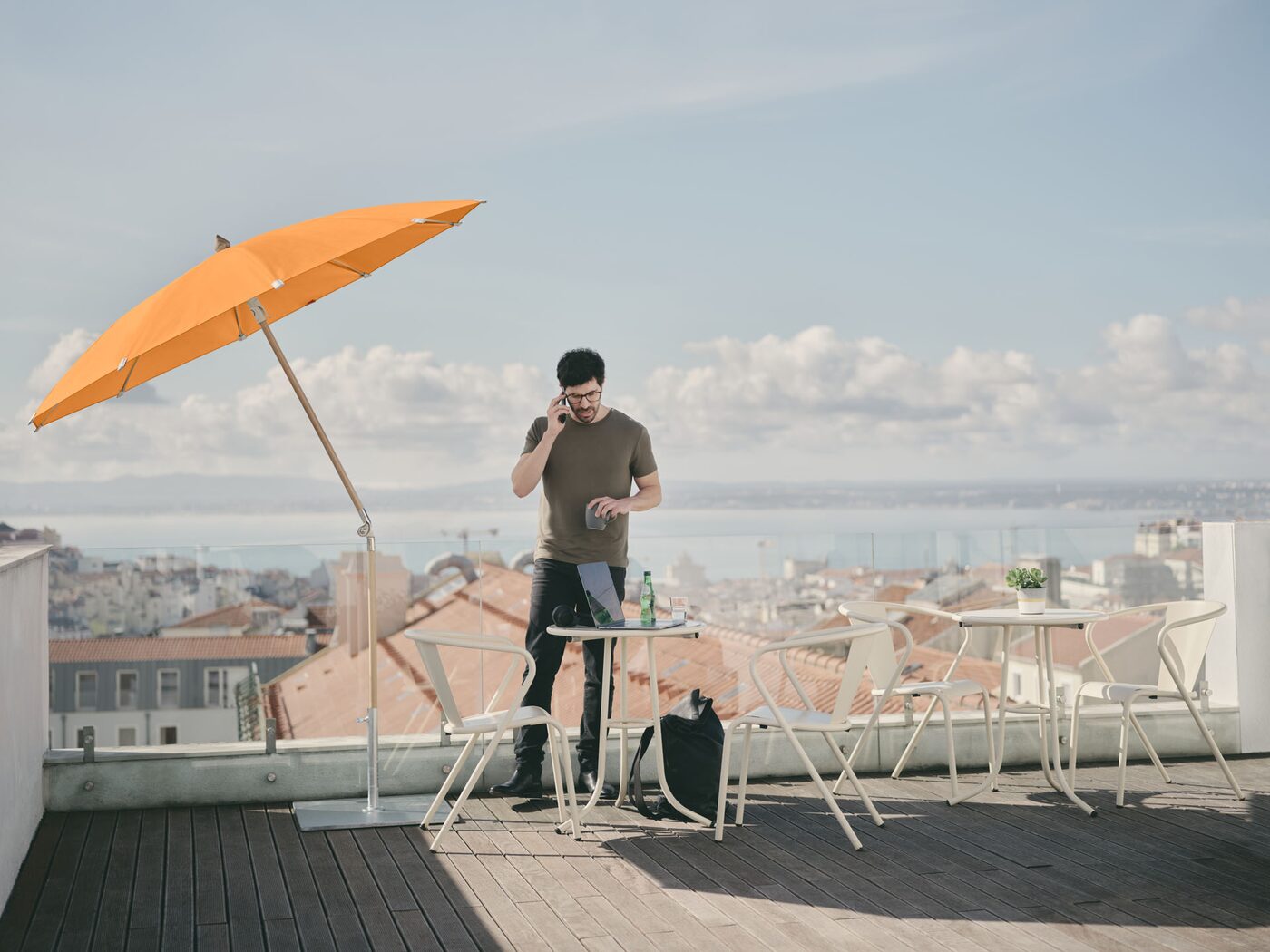 Alexo parasol on a rooftop city terrace
