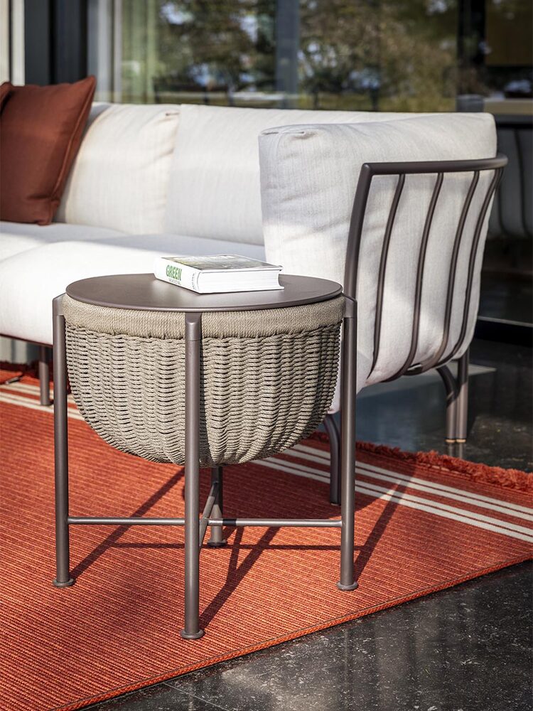 Cestlavie Outdoor woven table in a residential outdoor space
