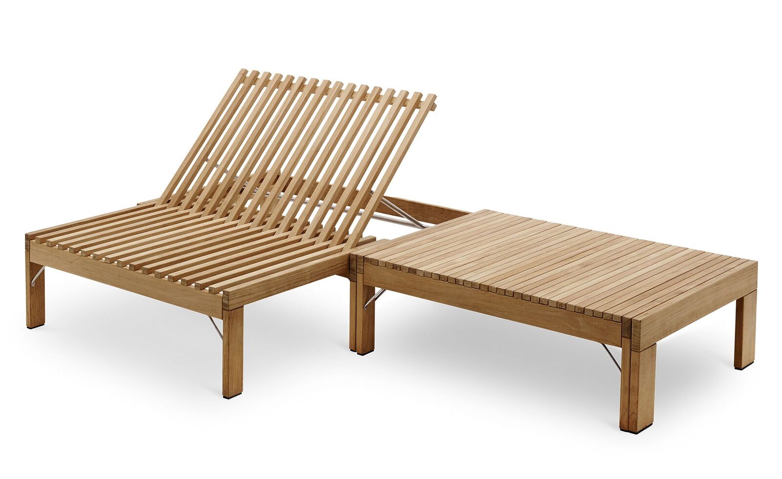 Riviera teak sunbed in an outdoor setting