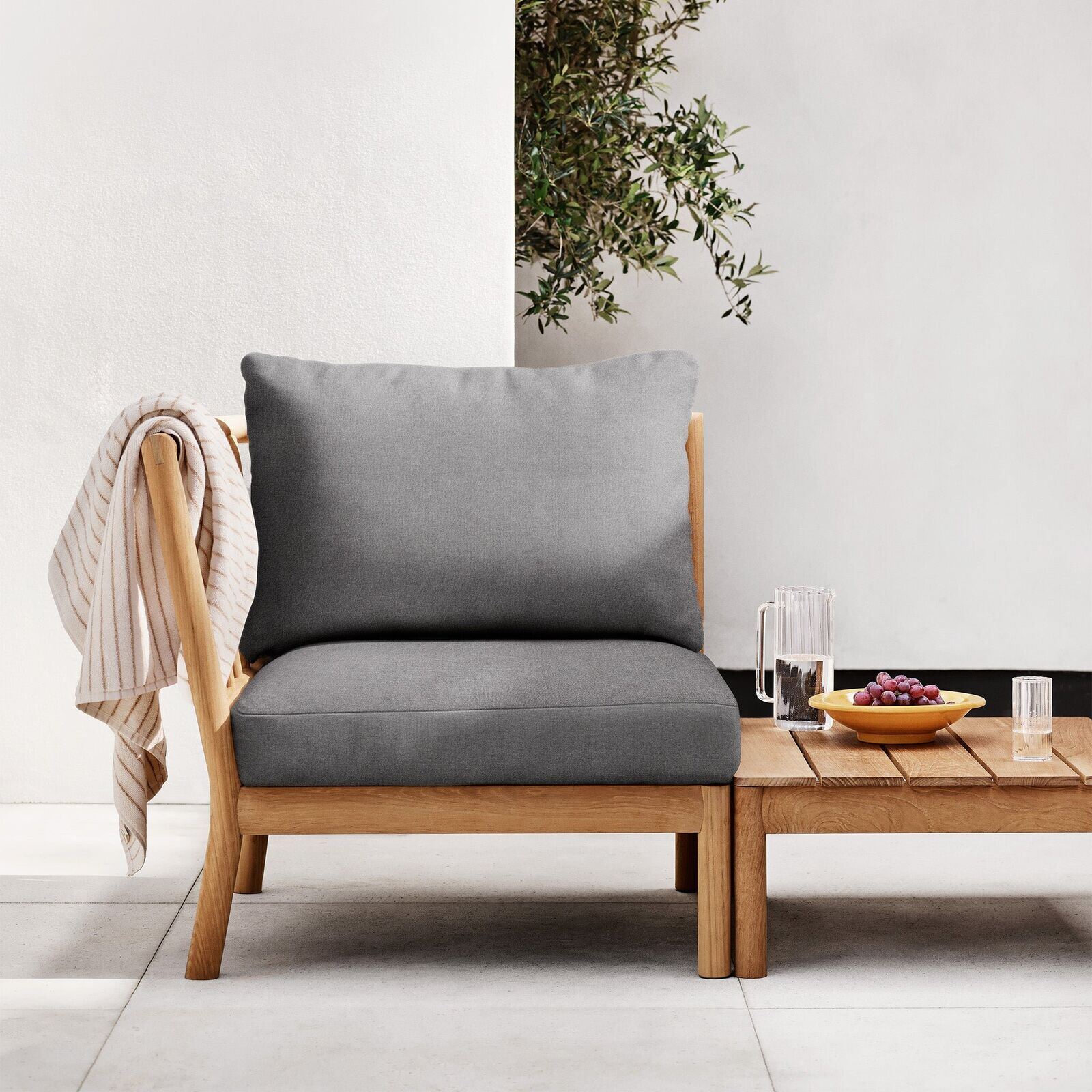 Tradition modular teak lounge in an outdoor setting